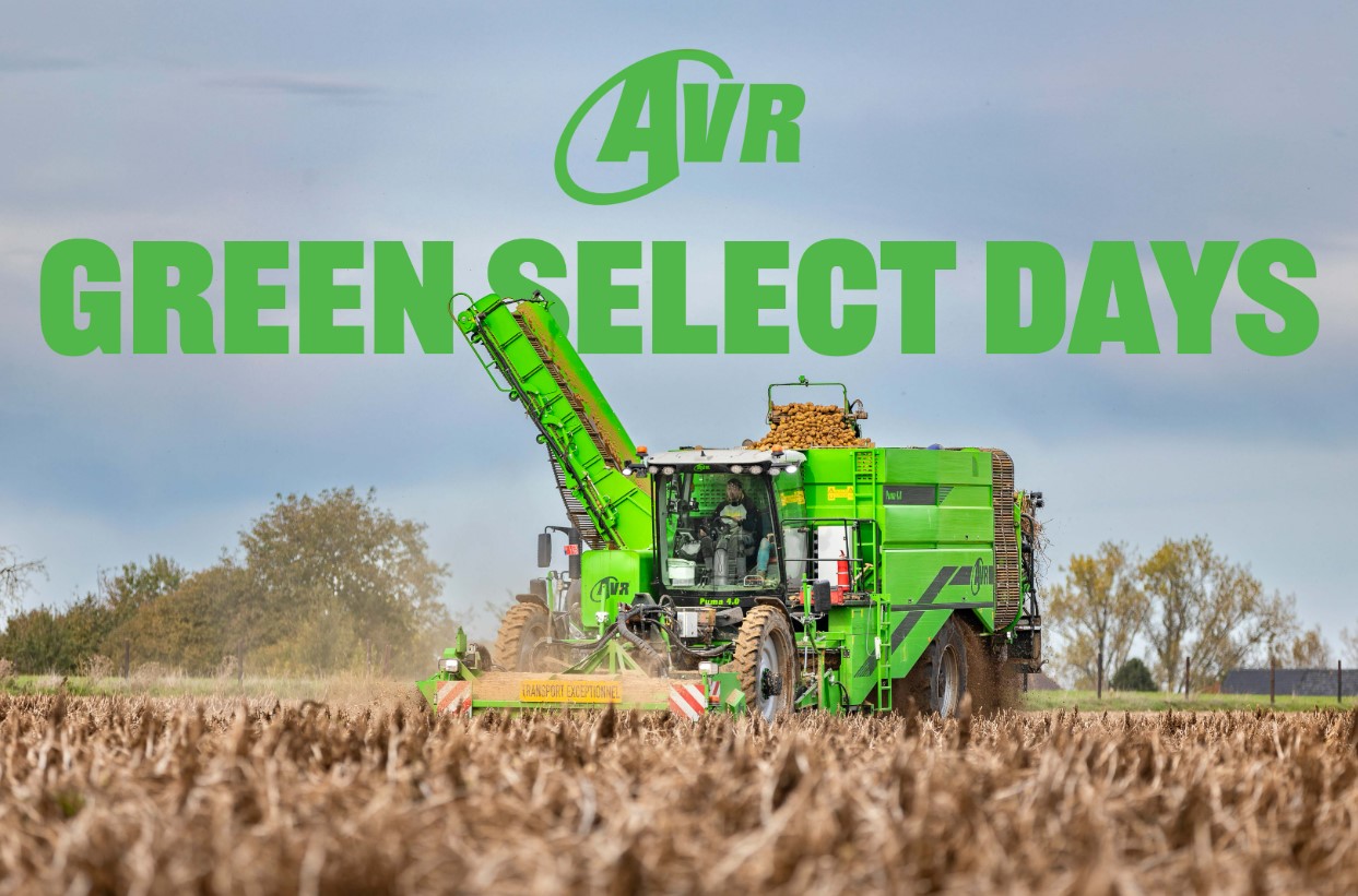 green farm machine in brown field