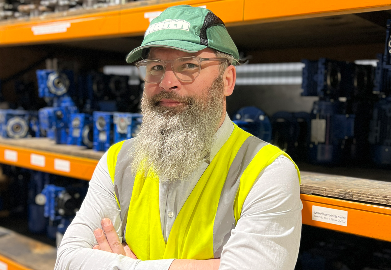 Alan Hewitt in Haith Group's factory with crossed arms