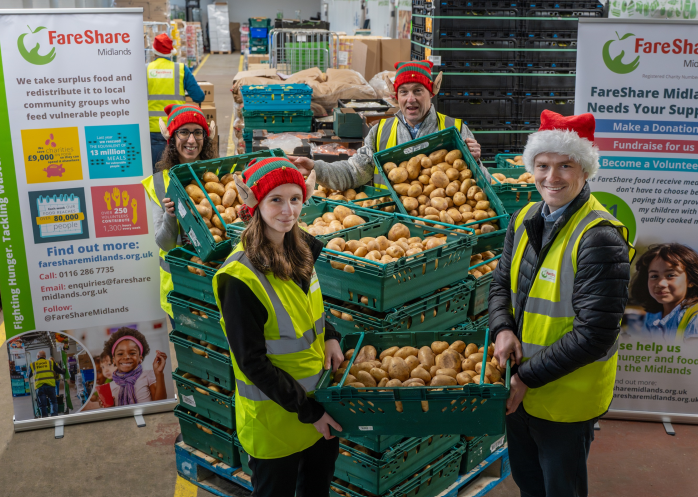 Fareshare and Branston staff with the donated potatoes