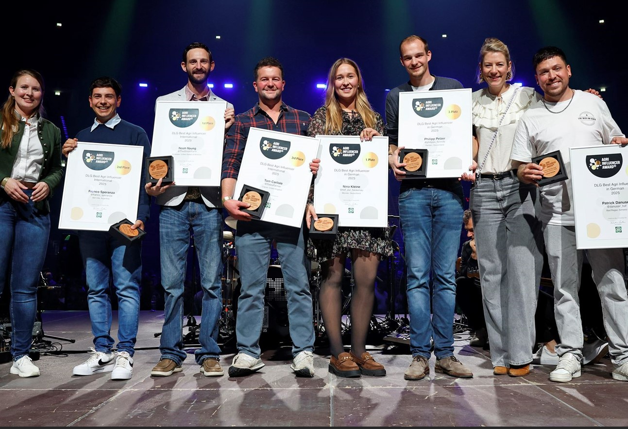 Line of young people holding certificates
