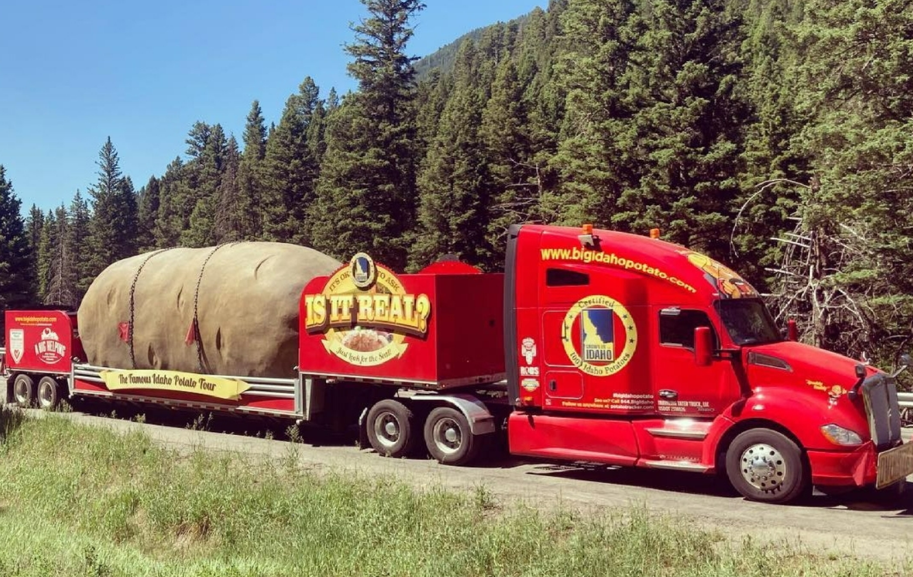 The Idaho Potato on a flatbed truck on the road