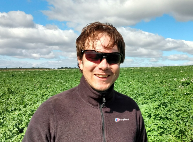 Kyran Maloney, potato specialist, in potato field