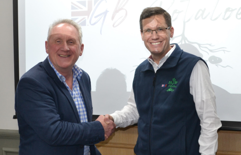 Mark Taylor and Alex Godfrey of GB Potatoes shaking hands