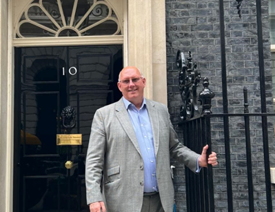 Nigel Jenney standing outside 10 Downing Street door