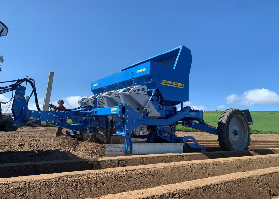 Standen potato planter shown in field