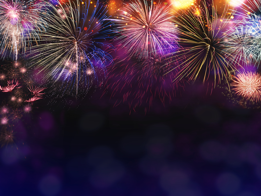 fireworks going off in sky to celebrate new year