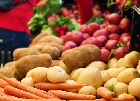 potatoes displayed on market stall